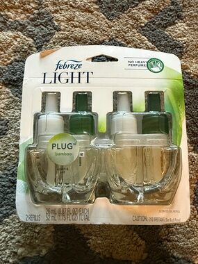Febreze LIGHT Bamboo Plug-In Refills with White and Green Tops